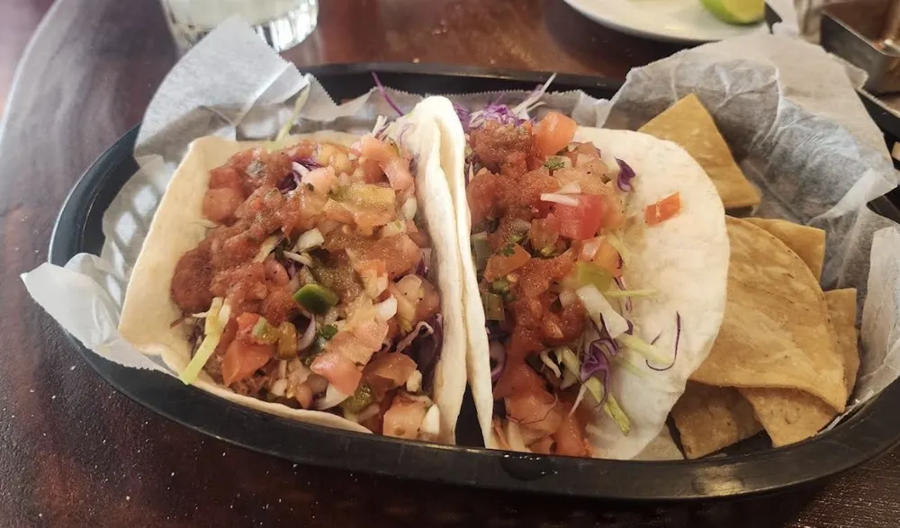 Tacos Pareja plate from the official Taco Rosado live menu